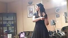 Indian wife in bedroom dancing for hubby to tease him to make his mood for sex